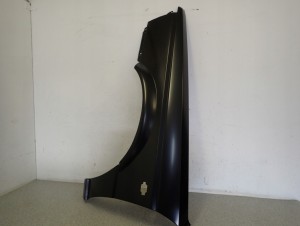 NISSAN SUNNY B12 KOMBI SEDAN 86-88 BŁOTNIK PRZEDNI LEWY NOWY 9/10 MINIATURA