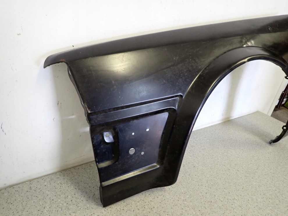 NISSAN BLUEBIRD B12 86-90 BŁOTNIK PRZEDNI LEWY NOWY 3/13