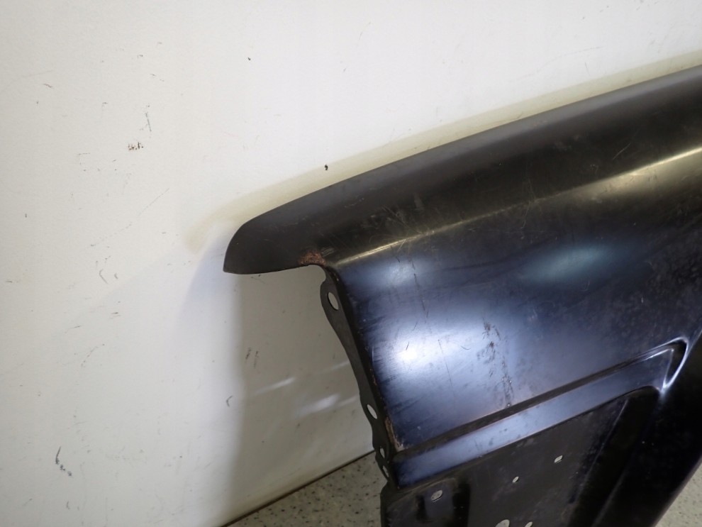 NISSAN BLUEBIRD B12 86-90 BŁOTNIK PRZEDNI LEWY NOWY 4/13