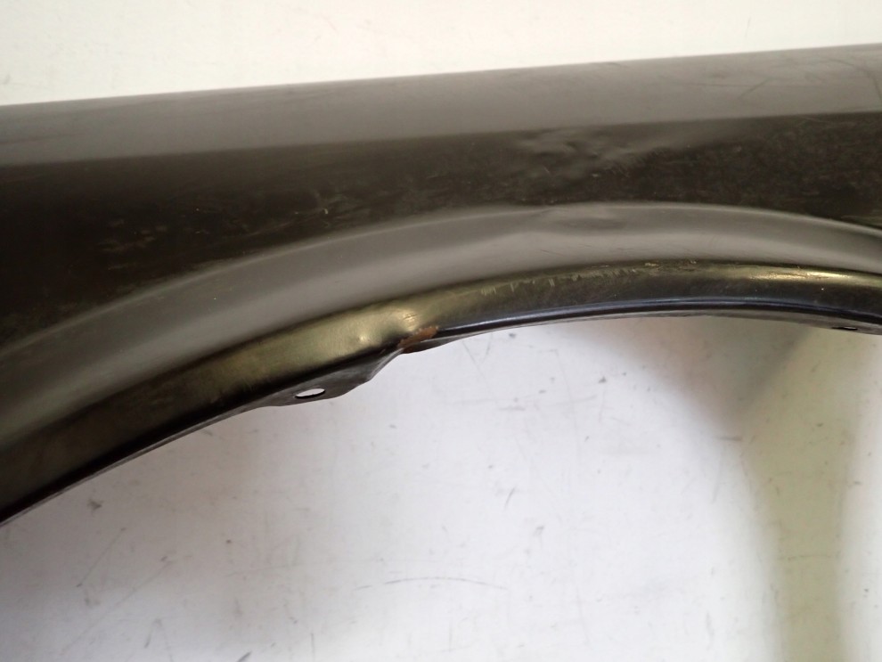 NISSAN BLUEBIRD B12 86-90 BŁOTNIK PRZEDNI LEWY NOWY 7/13