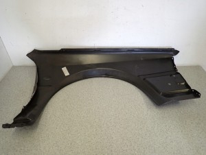 NISSAN BLUEBIRD B12 86-90 BŁOTNIK PRZEDNI LEWY NOWY 9/13 MINIATURA