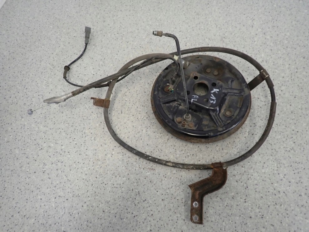 NISSAN MICRA K13 10- TARCZA KOTWICZNA TYLNA LEWA SZCZĘKI 3/4