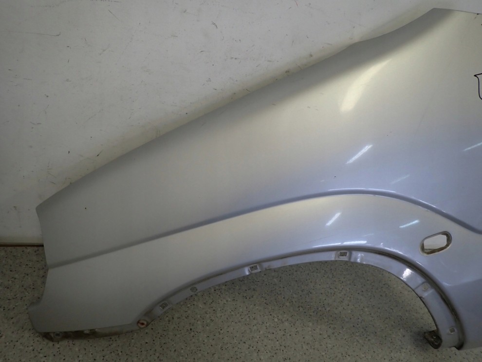 SUZUKI IGNIS I 00-03 BŁOTNIK PRZEDNI LEWY Z2S 5/14