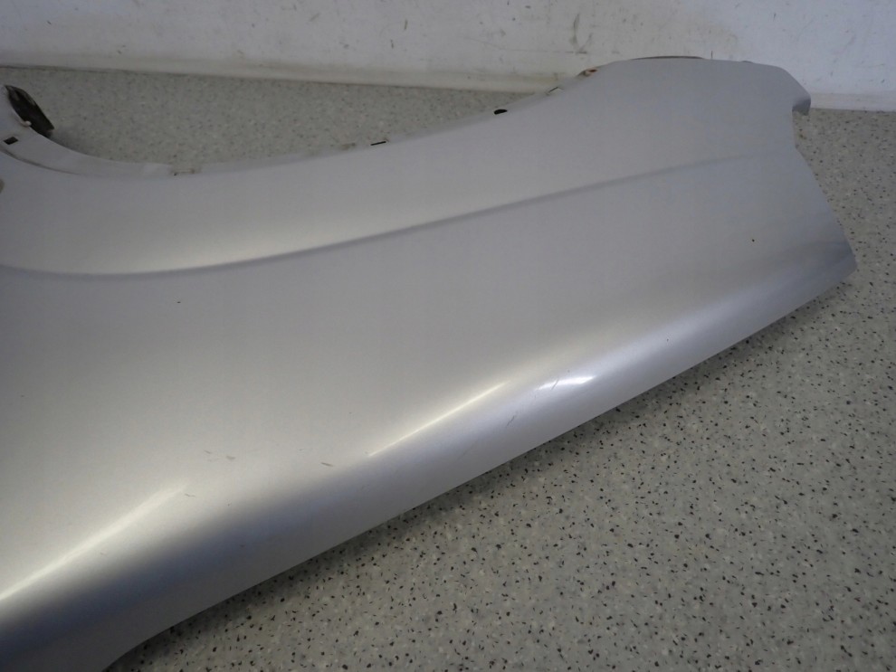 SUZUKI IGNIS I 00-03 BŁOTNIK PRZEDNI LEWY Z2S 12/14