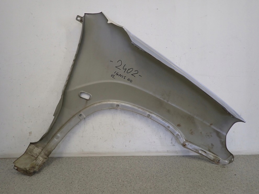 SUZUKI IGNIS I 00-03 BŁOTNIK PRZEDNI LEWY Z2S 13/14