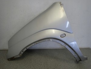 SUZUKI IGNIS I 00-03 BŁOTNIK PRZEDNI LEWY Z2S