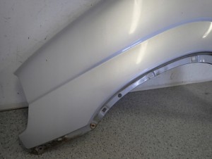 SUZUKI IGNIS I 00-03 BŁOTNIK PRZEDNI LEWY Z2S 6/14 MINIATURA