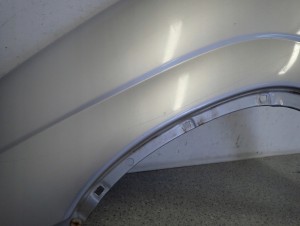 SUZUKI IGNIS I 00-03 BŁOTNIK PRZEDNI LEWY Z2S 7/14 MINIATURA