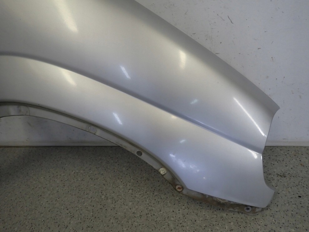 SUZUKI IGNIS I 00-03 BŁOTNIK PRZEDNI PRAWY Z2S 5/9