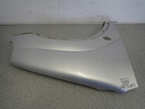 SUZUKI IGNIS I 00-03 BŁOTNIK PRZEDNI PRAWY Z2S 7/9 MINIATURA