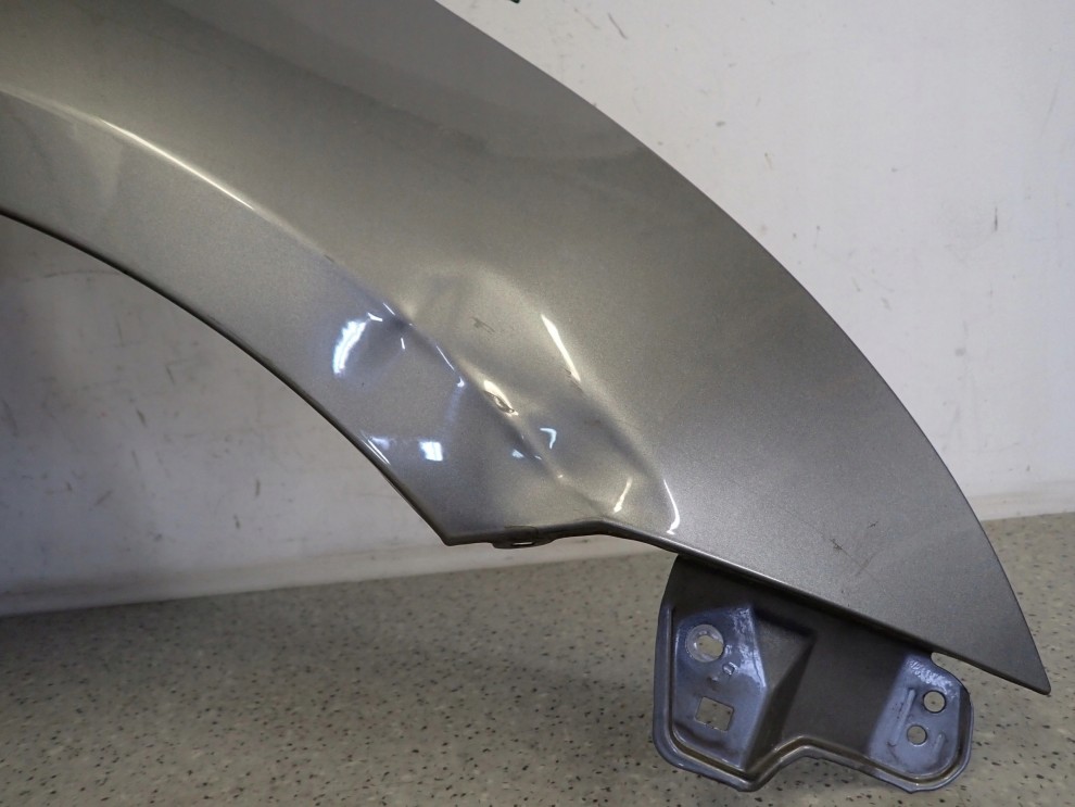 SUZUKI SWIFT MK7 10-16 BŁOTNIK PRZEDNI PRAWY ZCD 5/13