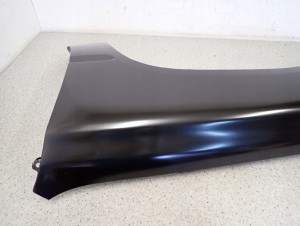 TOYOTA HILUX 89-93 BŁOTNIK PRZEDNI LEWY 6/8 MINIATURA