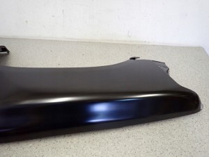 TOYOTA HILUX 89-93 BŁOTNIK PRZEDNI LEWY 7/8 MINIATURA