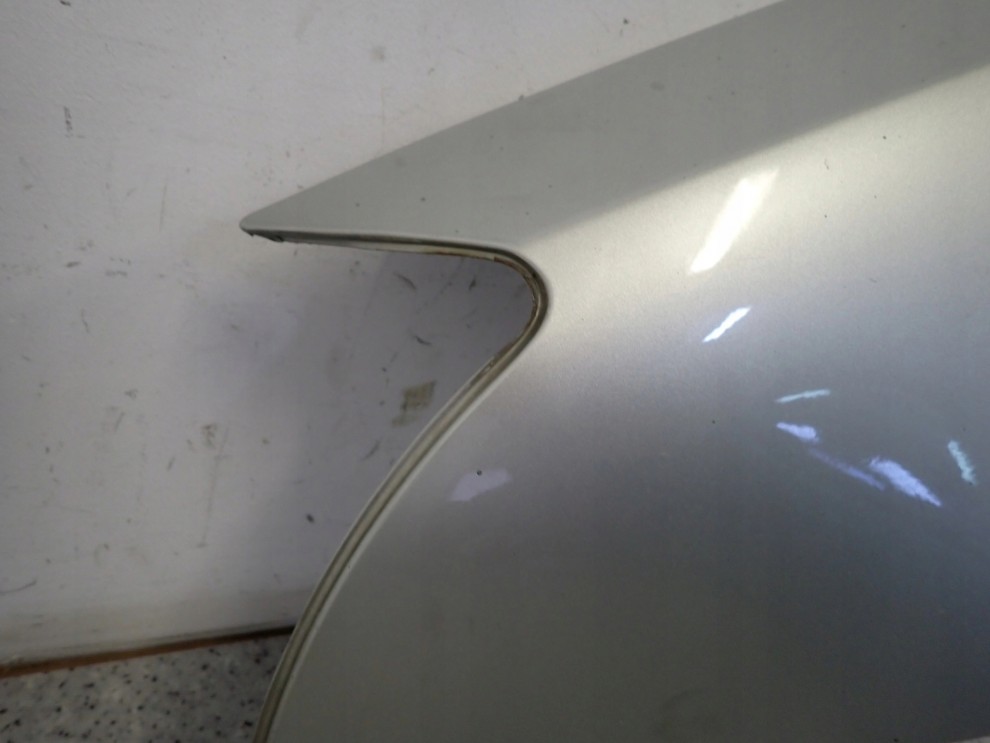 TOYOTA AVENSIS T25 03- BŁOTNIK PRZEDNI LEWY 1C0 5/10