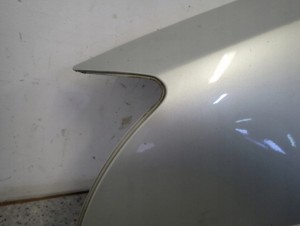 TOYOTA AVENSIS T25 03- BŁOTNIK PRZEDNI LEWY 1C0 5/10 MINIATURA