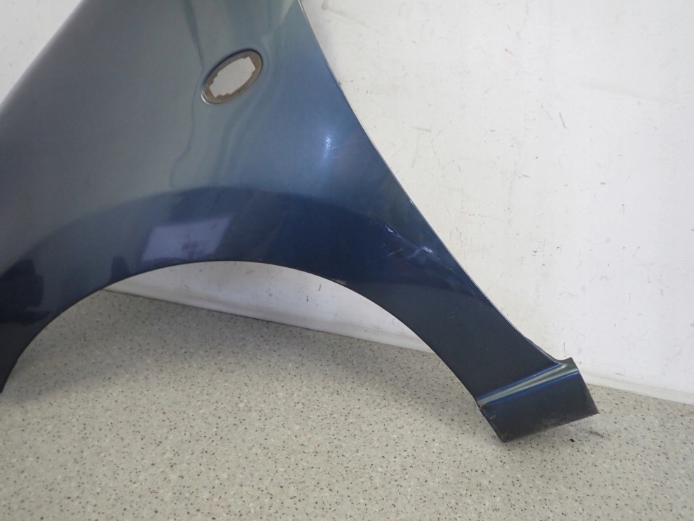 SUZUKI ALTO NISSAN PIXO 09-14 BŁOTNIK PRZEDNI LEWY ZY4 5/12