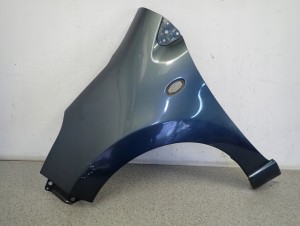 SUZUKI ALTO NISSAN PIXO 09-14 BŁOTNIK PRZEDNI LEWY ZY4