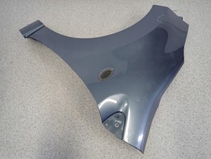 SUZUKI ALTO NISSAN PIXO 09-14 BŁOTNIK PRZEDNI LEWY ZY4 7/12 MINIATURA