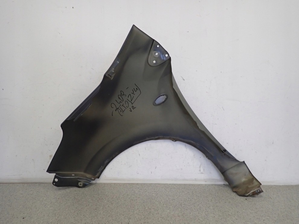 SUZUKI ALTO NISSAN PIXO 09-14 BŁOTNIK PRZEDNI PRAWY ZY4 10/10