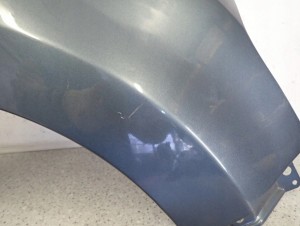 SUZUKI ALTO NISSAN PIXO 09-14 BŁOTNIK PRZEDNI PRAWY ZY4 6/10 MINIATURA