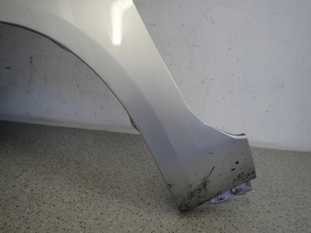 SUZUKI SPLASH 08-14 BŁOTNIK PRZEDNI LEWY ZCC 7/10