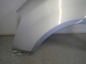 SUZUKI SPLASH 08-14 BŁOTNIK PRZEDNI LEWY ZCC 4/10 MINIATURA