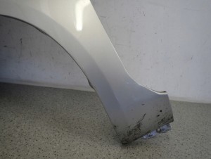 SUZUKI SPLASH 08-14 BŁOTNIK PRZEDNI LEWY ZCC 7/10 MINIATURA