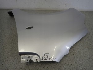 SUZUKI SPLASH 08-14 BŁOTNIK PRZEDNI LEWY ZCC 9/10 MINIATURA