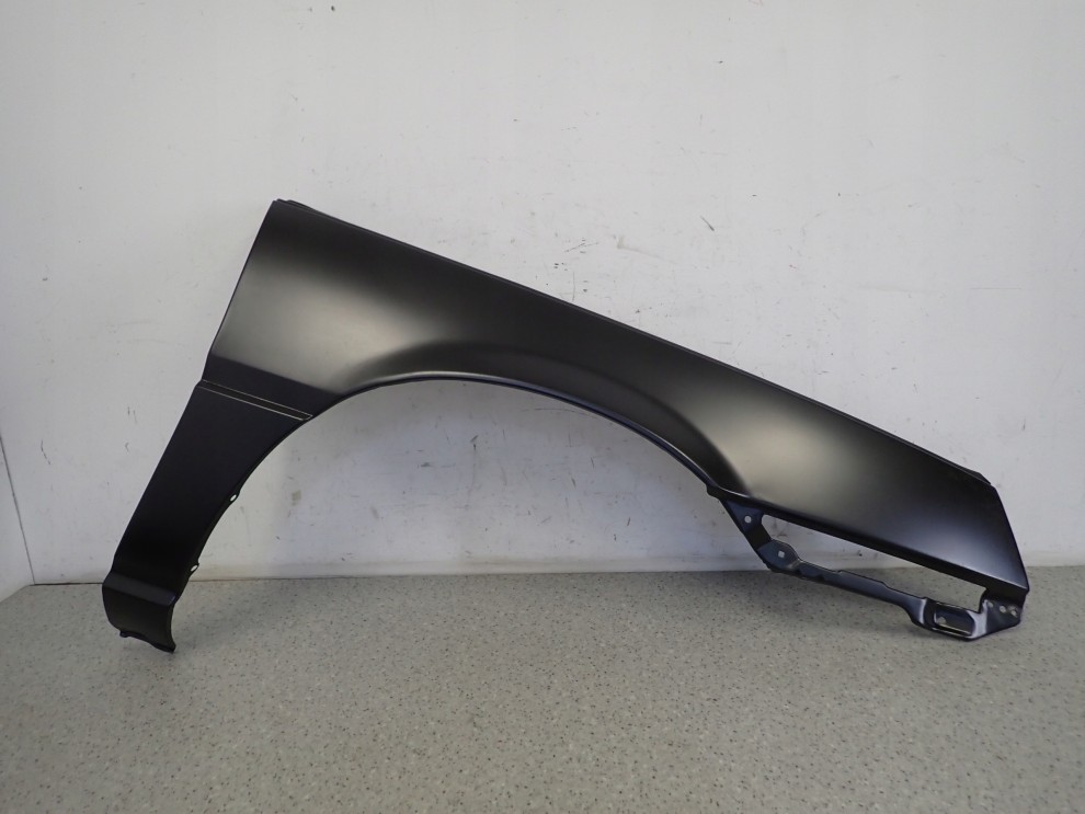 MITSUBISHI COLT LANCER 84-86 BŁOTNIK PRZEDNI PRAWY 1/4