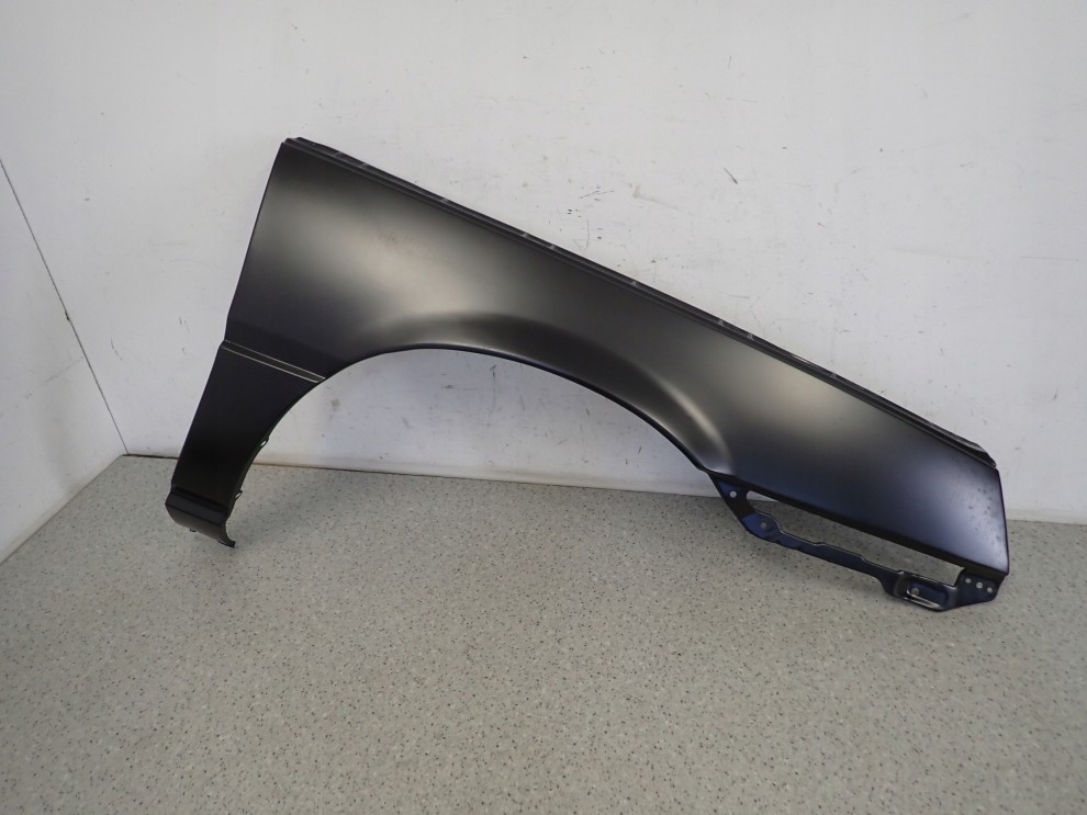 MITSUBISHI COLT LANCER 84-86 BŁOTNIK PRZEDNI PRAWY 2/4