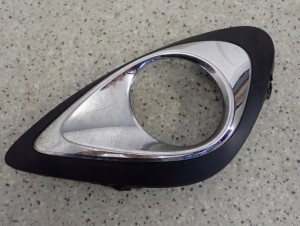 NISSAN MICRA K13 LIFT 14- KRATKA ATRAPA ZAŚLEPKA HALOGENU LEWA