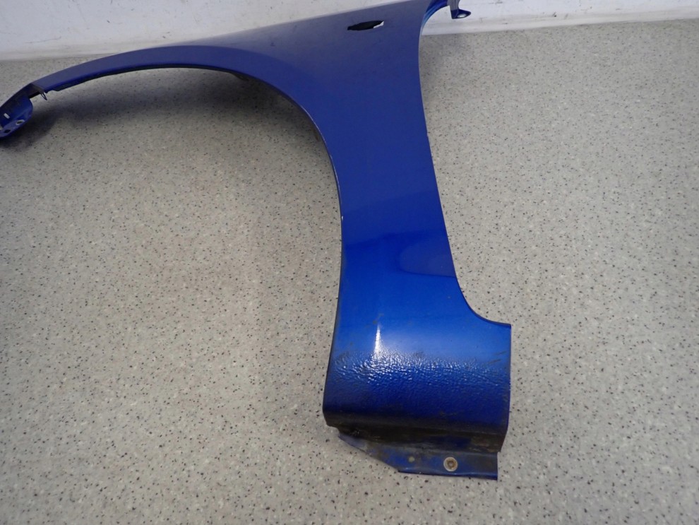 SUZUKI SWIFT MK7 10-16 BŁOTNIK PRZEDNI LEWY ZCG 8/9