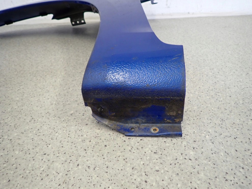 SUZUKI SWIFT MK7 10-16 BŁOTNIK PRZEDNI LEWY ZCG 9/9