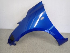 SUZUKI SWIFT MK7 10-16 BŁOTNIK PRZEDNI LEWY ZCG 2/9 MINIATURA