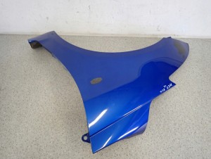 SUZUKI SWIFT MK7 10-16 BŁOTNIK PRZEDNI LEWY ZCG 6/9 MINIATURA