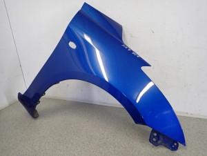 SUZUKI SWIFT MK7 10-16 BŁOTNIK PRZEDNI PRAWY ZCG 2/7 MINIATURA