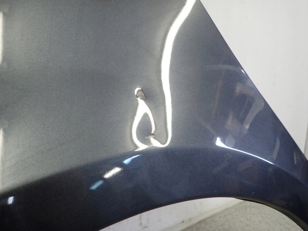 SUZUKI SWIFT MK6 05-09 BŁOTNIK PRZEDNI LEWY ZY4 7/16