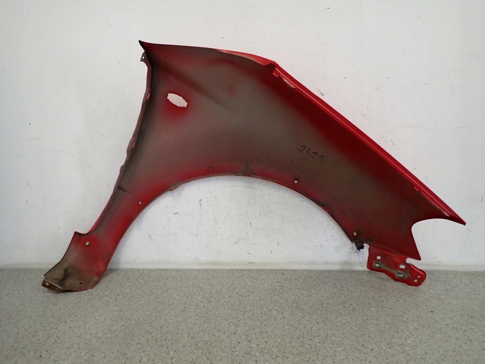 SUZUKI SX4 06-12 BŁOTNIK PRZEDNI LEWY ZCF 9/10