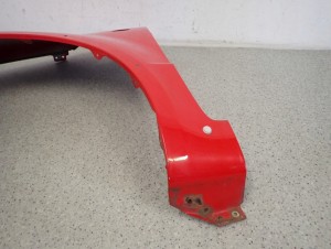 SUZUKI SX4 06-12 BŁOTNIK PRZEDNI LEWY ZCF 7/10 MINIATURA