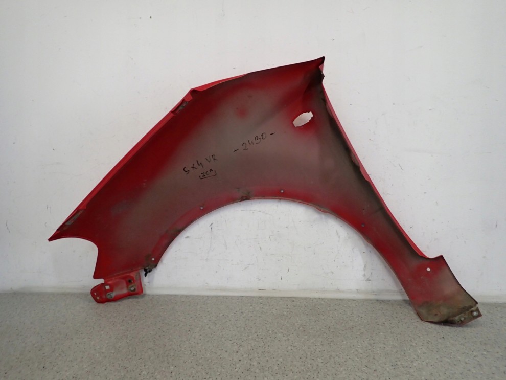 SUZUKI SX4 06-12 BŁOTNIK PRZEDNI PRAWY ZCF 12/14