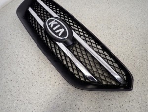 KIA CARENS III 06- ATRAPA GRILL KRATA WLOTU 4/12 MINIATURA