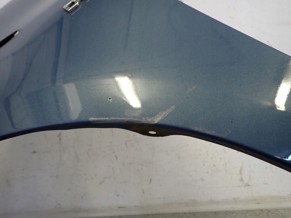 TOYOTA YARIS II 06-11 BŁOTNIK PRZEDNI LEWY 8T1 3/15