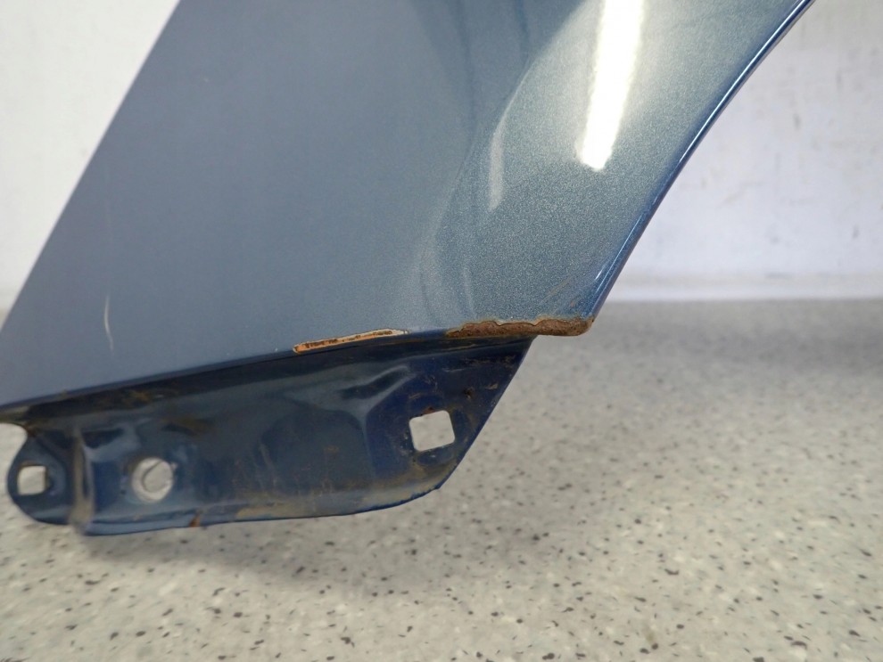 TOYOTA YARIS II 06-11 BŁOTNIK PRZEDNI LEWY 8T1 5/15