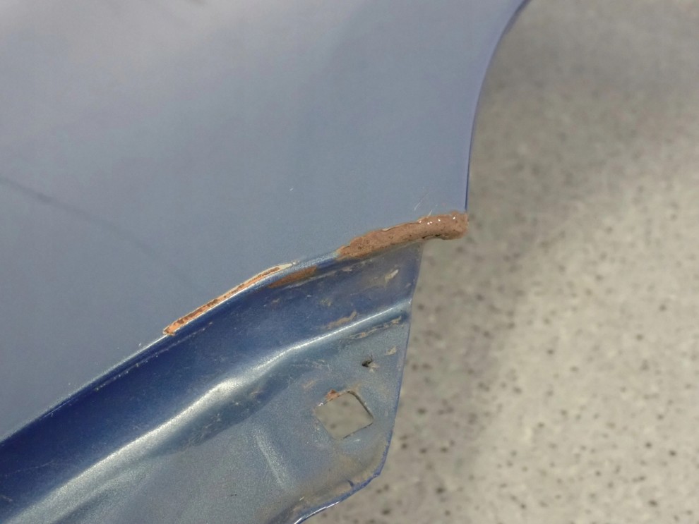 TOYOTA YARIS II 06-11 BŁOTNIK PRZEDNI LEWY 8T1 11/15