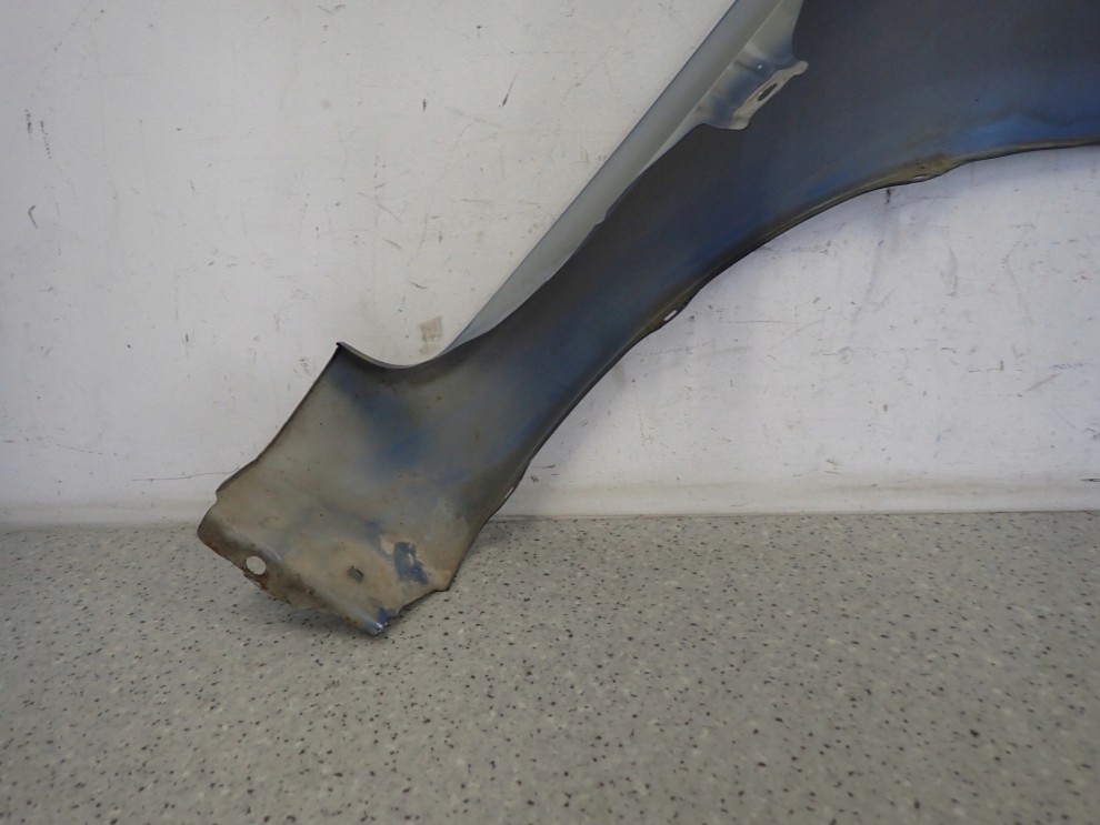 TOYOTA YARIS II 06-11 BŁOTNIK PRZEDNI LEWY 8T1 15/15