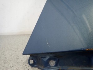 TOYOTA YARIS II 06-11 BŁOTNIK PRZEDNI LEWY 8T1 6/15 MINIATURA