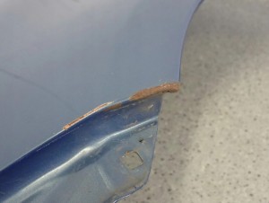 TOYOTA YARIS II 06-11 BŁOTNIK PRZEDNI LEWY 8T1 11/15 MINIATURA