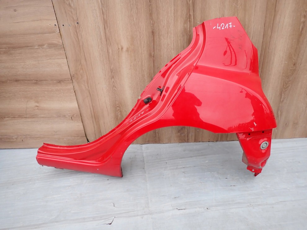 NISSAN MICRA K12 02-10 BŁOTNIK TYLNY LEWY 1/8