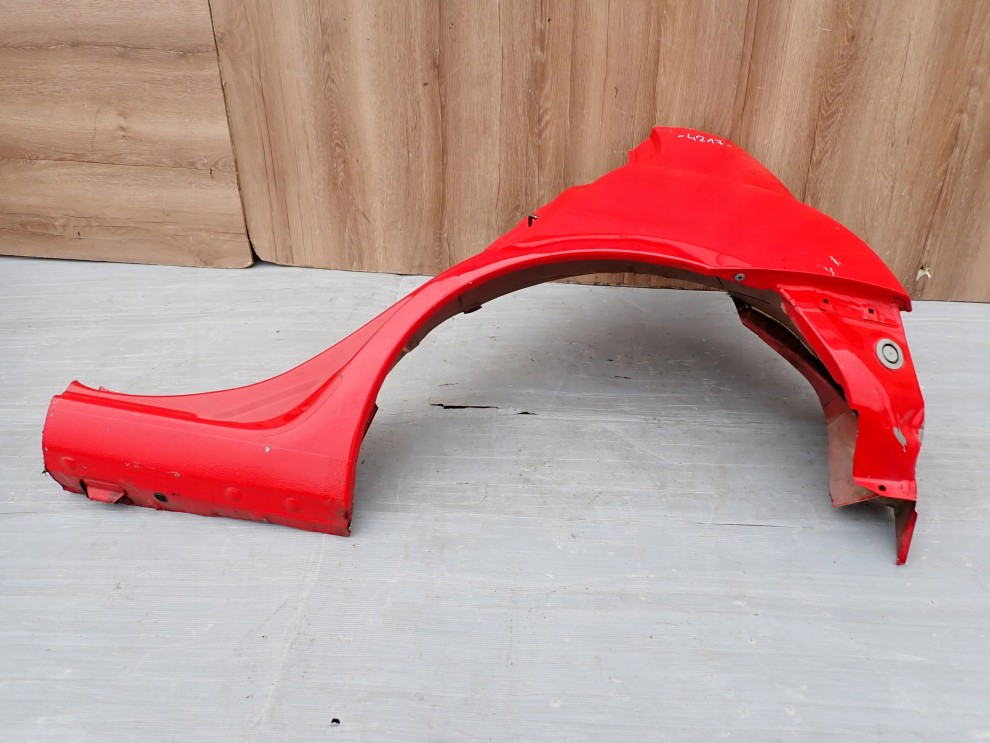 NISSAN MICRA K12 02-10 BŁOTNIK TYLNY LEWY 5/8