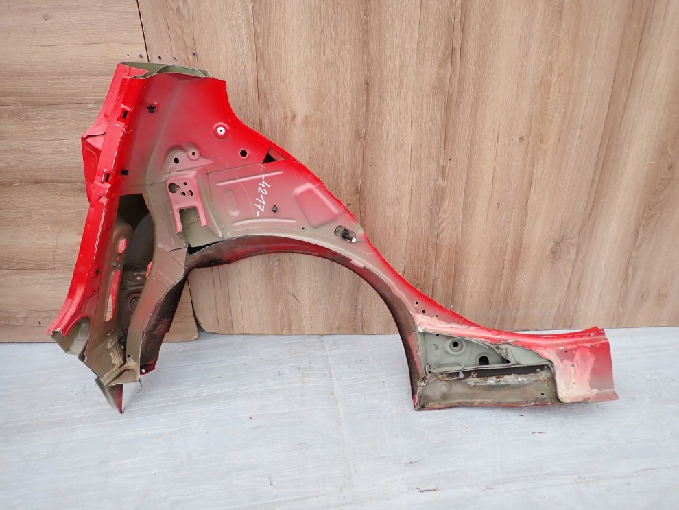 NISSAN MICRA K12 02-10 BŁOTNIK TYLNY LEWY 7/8